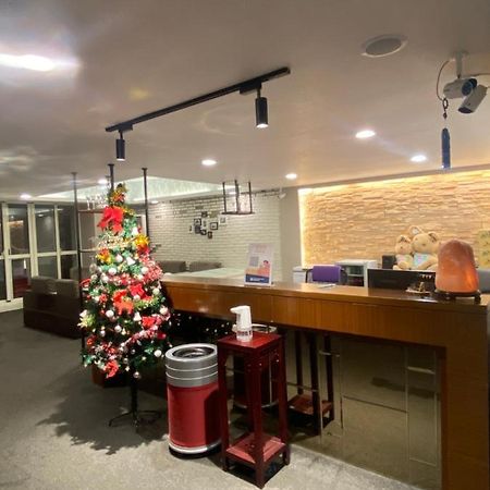 Aiyue Hotel Huwei Екстер'єр фото