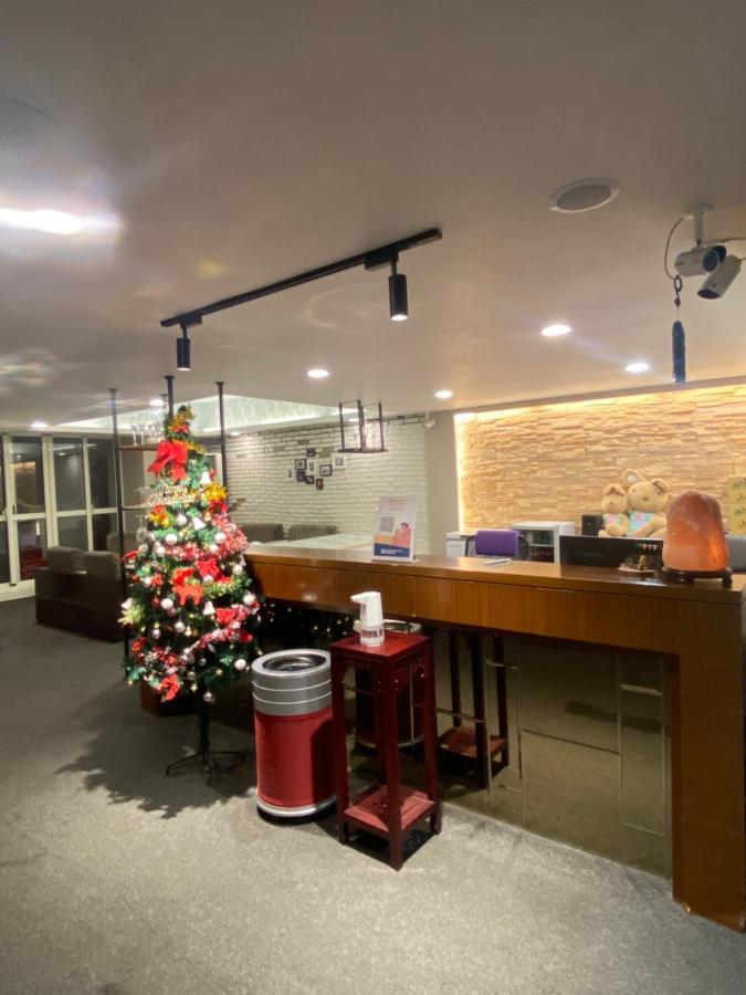 Aiyue Hotel Huwei Екстер'єр фото