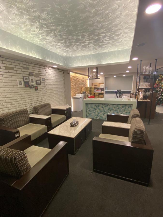 Aiyue Hotel Huwei Екстер'єр фото